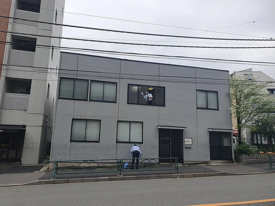 Workers cleaning the windows of a building